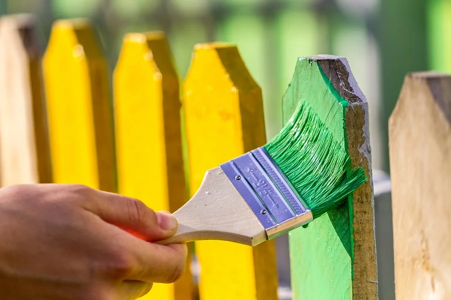 painting a fence