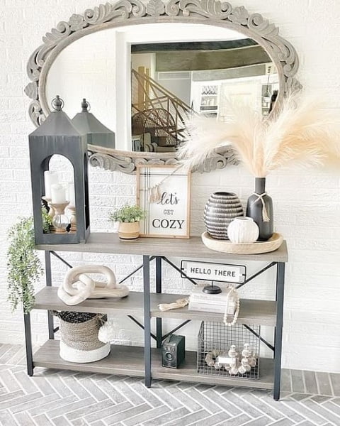 Warm And Inviting: A Stunning Lantern-Adorned Entryway With Up-to-Date Modern Decor decor with lanterns