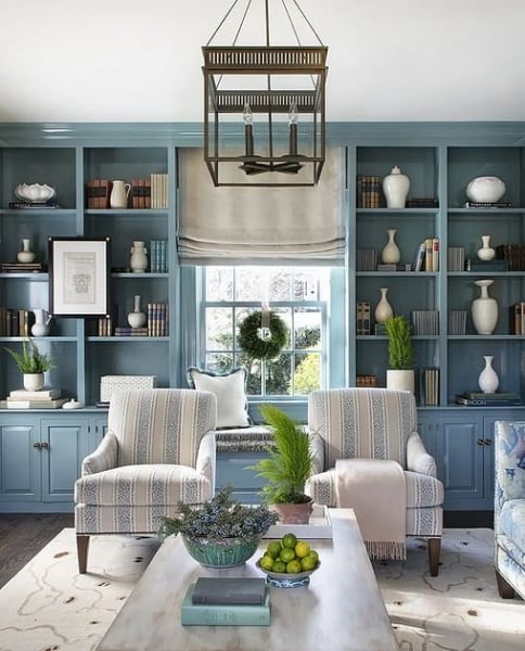 Tranquil And Elegant Blue Library Decorated With White Porcelain Vases By Blyth-Collinson Interiors decor with lanterns