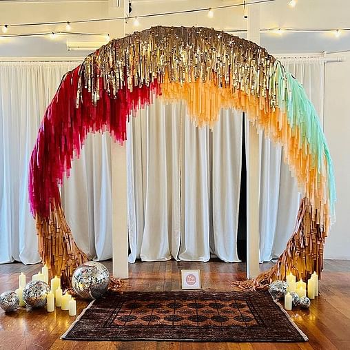 Vibrant And Sustainable Streamer Decor For Outdoor Weddings decor with streamers
