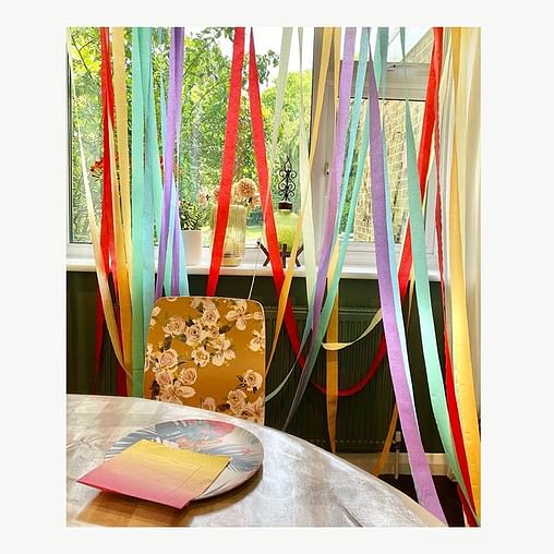 Vibrant And Sustainable Tween Party Decor With Paper Streamers decor with streamers