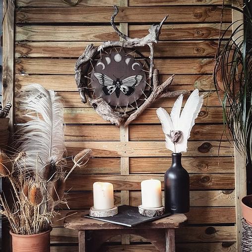 Boho Dark Mystical Decorating Idea With Handcrafted Driftwood Wall Hangings And Moth Painting mystical decor