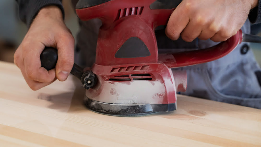 sanding a wood surface