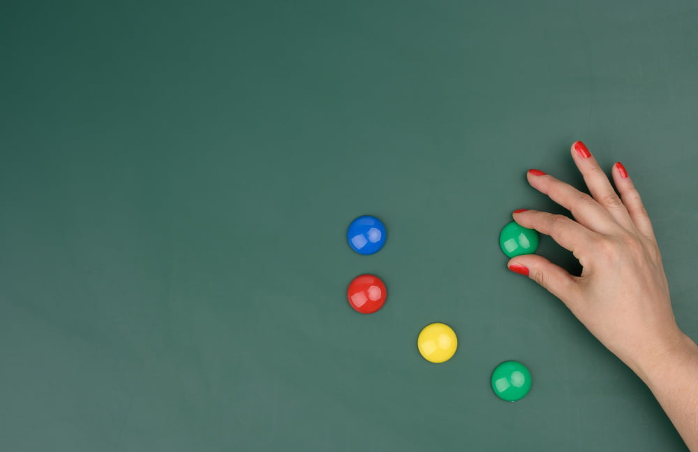 Magnets on Green Chalkboard