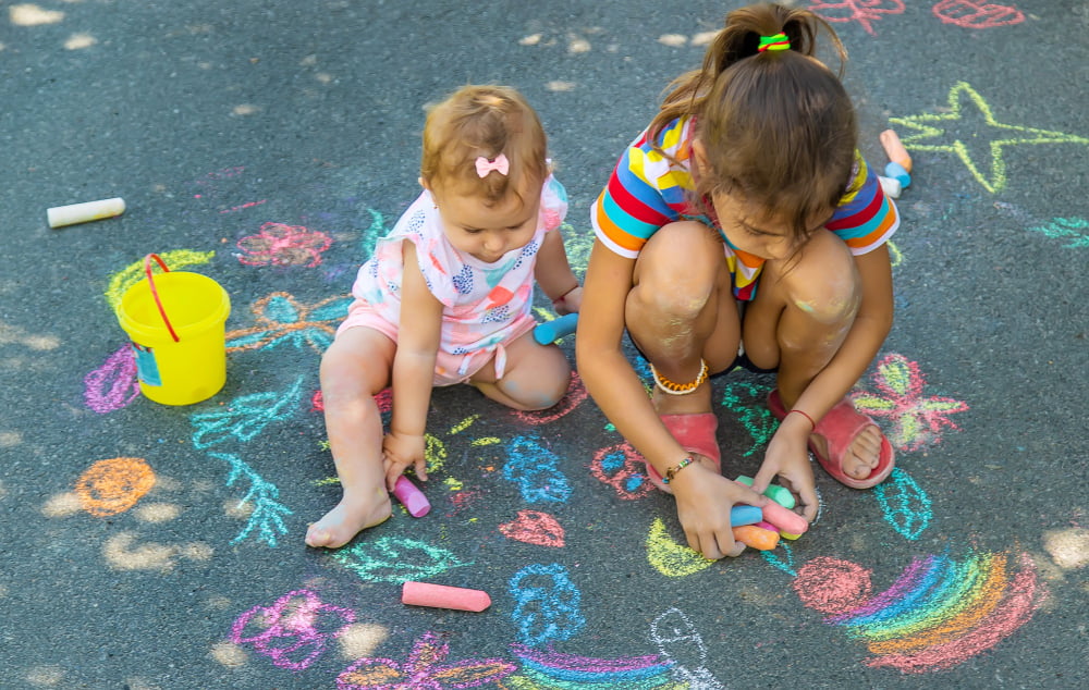 Children with Sidewalk Chalk Drawing