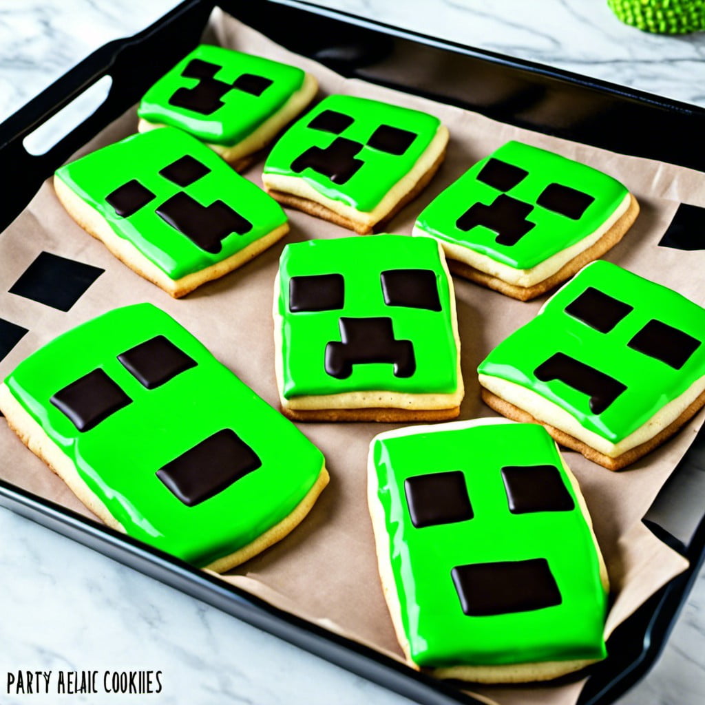 creeper face cookies on a tray