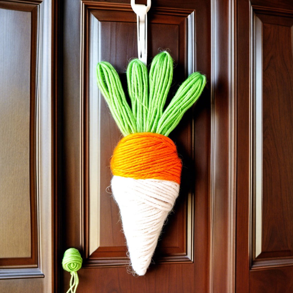 yarn wrapped carrots door hanger