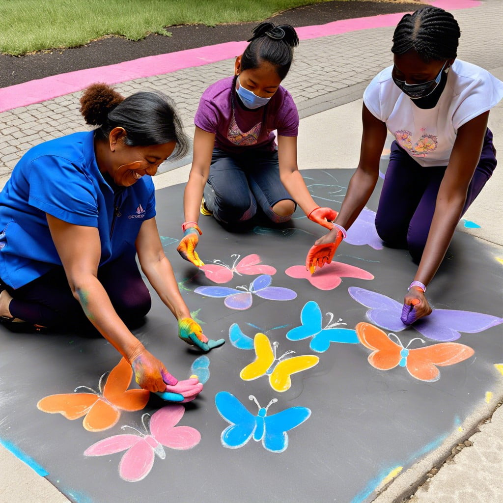 chalk butterfly footprints encourage participants to use their feet to stamp butterfly shapes